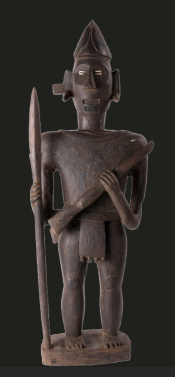 A Wooden Warrior of the Konyak Tribe A Wooden Warrior of the Konyak Tribe