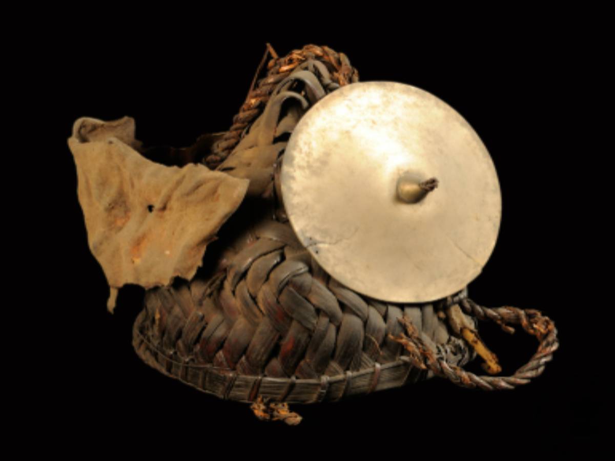 A conical helmet crafted from cane and bamboo