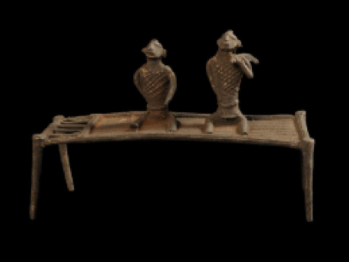 Cot with Two Human Effigies Cot with Two Human Effigies