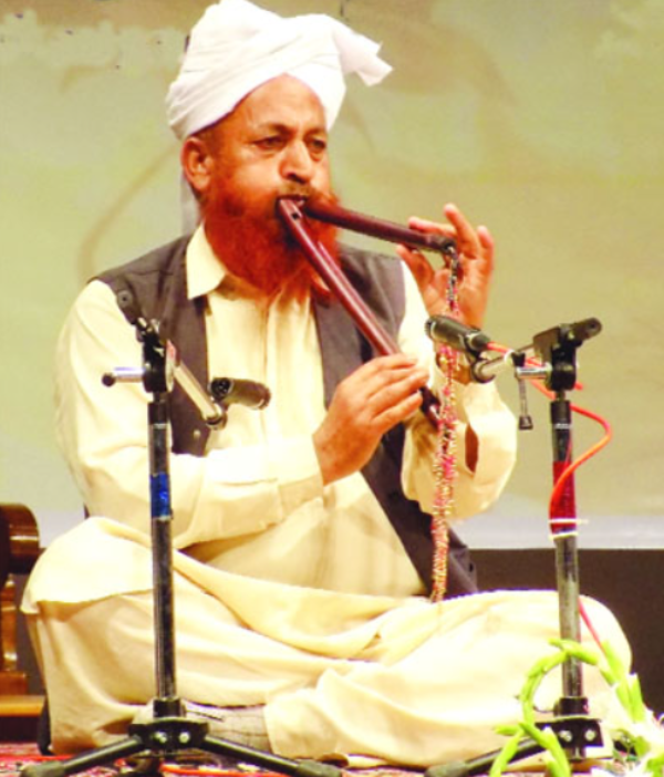 Man playing Jodhi /Do Naal Man playing Jodhi /Do Naal