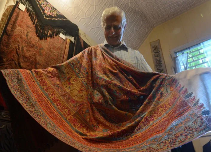 Man with a woolen shawl Man with a woolen shawl