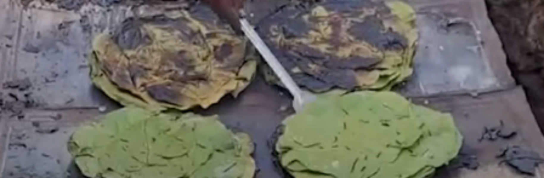 Frying of Pitha Frying of Pitha