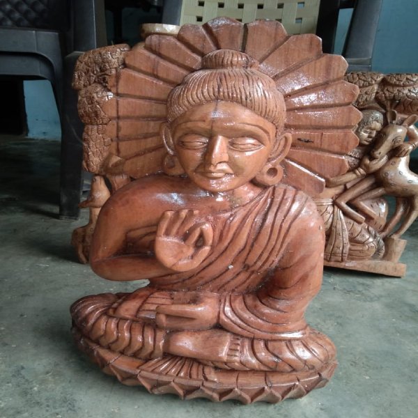 Wooden Idol of Lord Buddha Wooden Idol of Lord Buddha