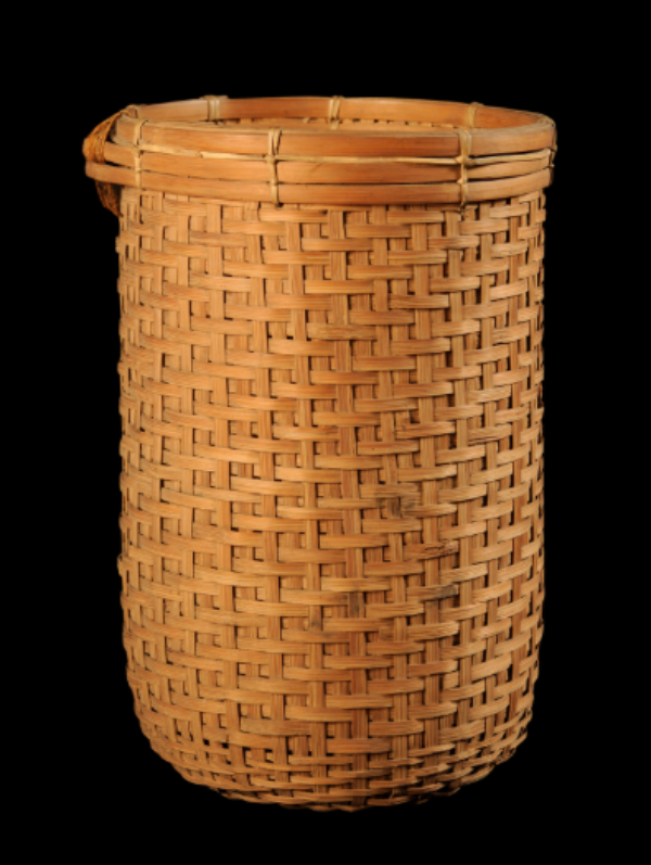 A flat bamboo basket