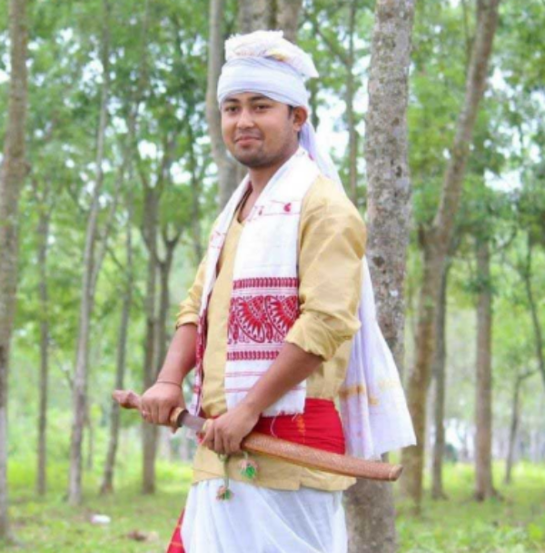 Sutiya men in traditional Attire Sutiya men in traditional Attire