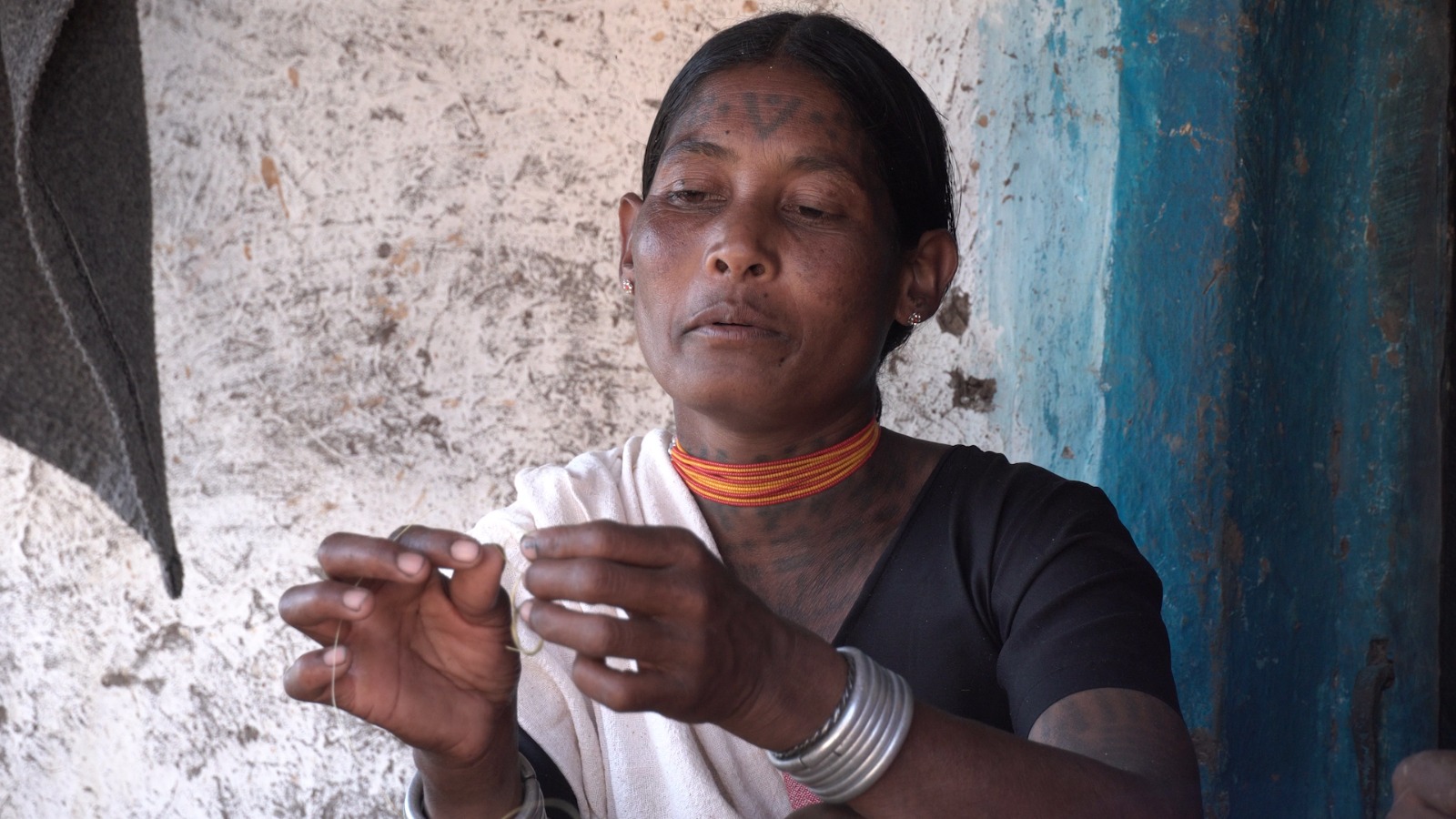 Women making Biran Mala Women making Biran Mala