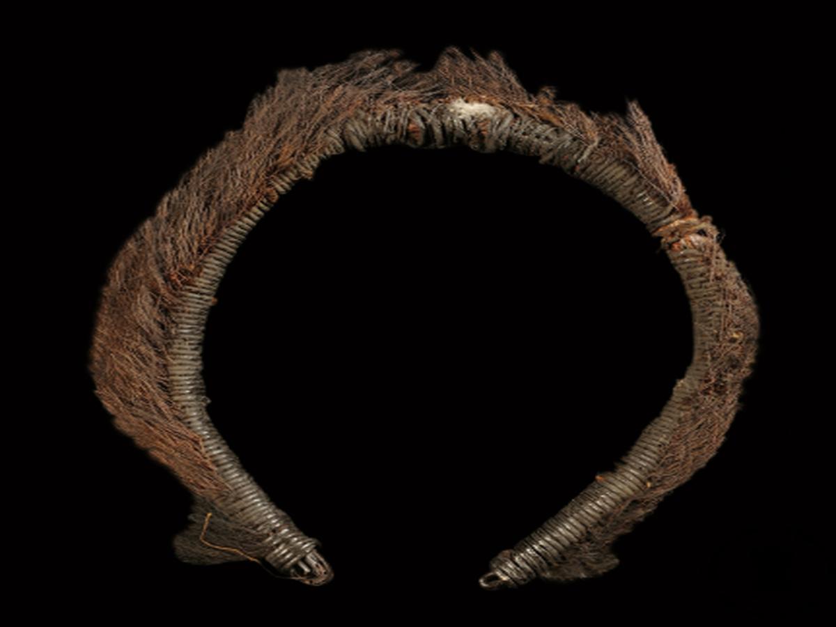 A U-shaped cane headdress A U-shaped cane headdress