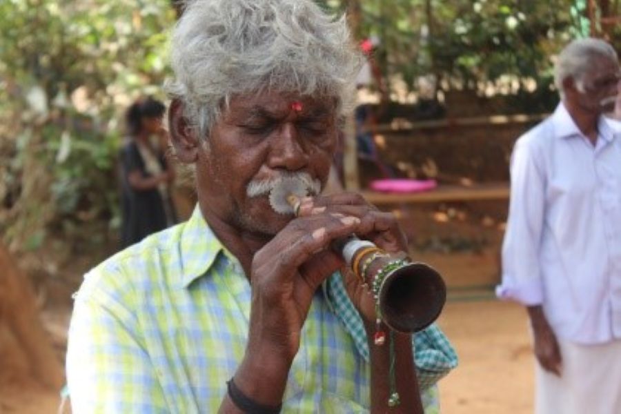 Man playing Musical Instrument Man playing Musical Instrument